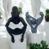 3D-Printed Speckled Meditating Figure Sculpture - Image 2